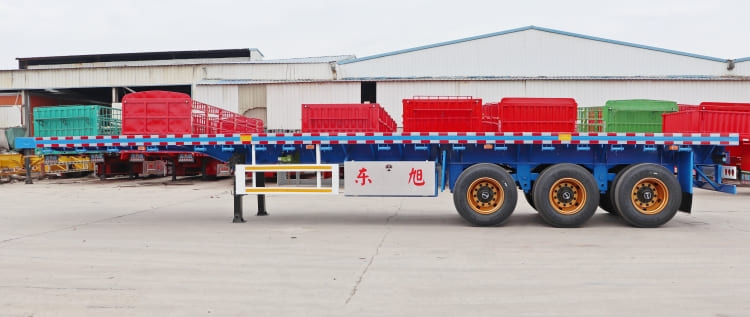Tri Axle 40 Foot Flatbed Trailer for Sale in Mozambique | Custom Flatbed Trailer Manufacturers